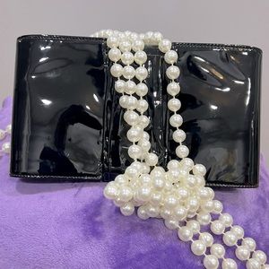 Christian Louboutin Clutch- Stylish Patent Leather Clutch